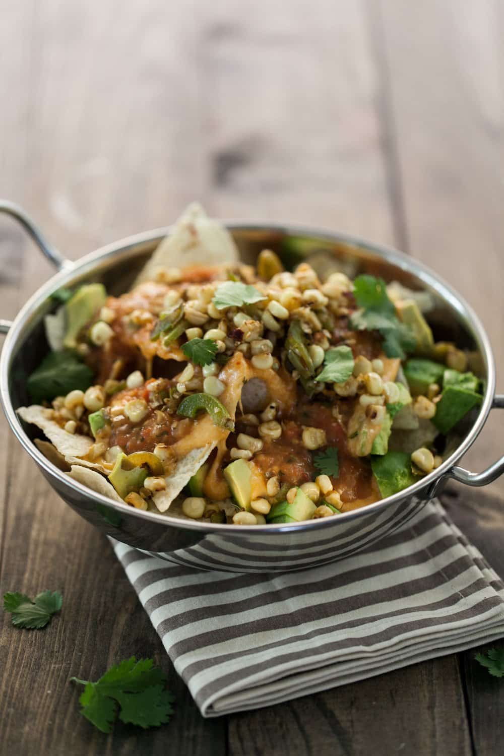 Nachos with Corn Relish, Roasted Tomato Salsa, and Avocado