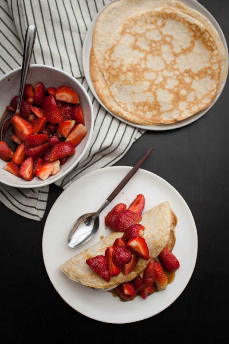 Rye Crepes with Sorghum-Bourbon Strawberries + Ice Cream